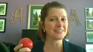 Allison Shields Johs holding a tomato